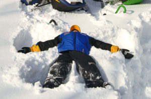 Snow angels after a long ride on the trails